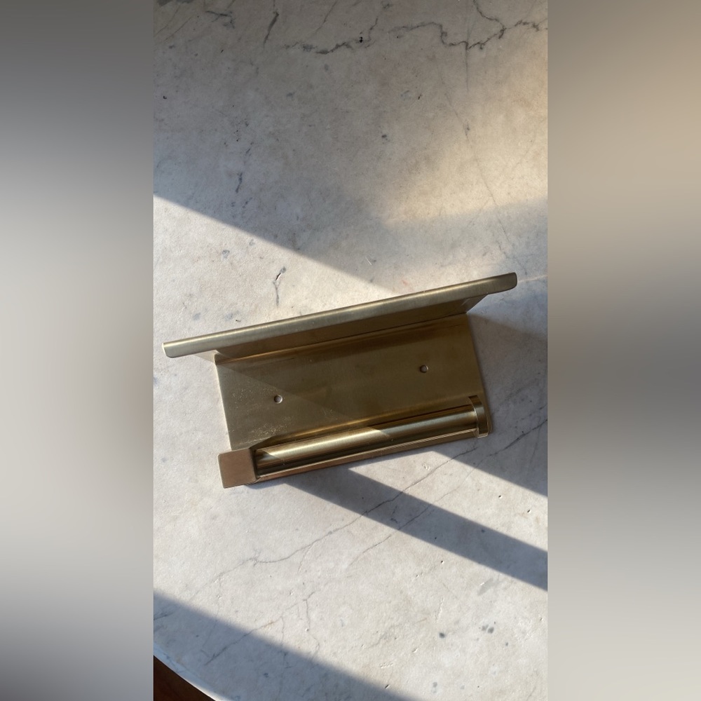 gold toilet paper holder and tray